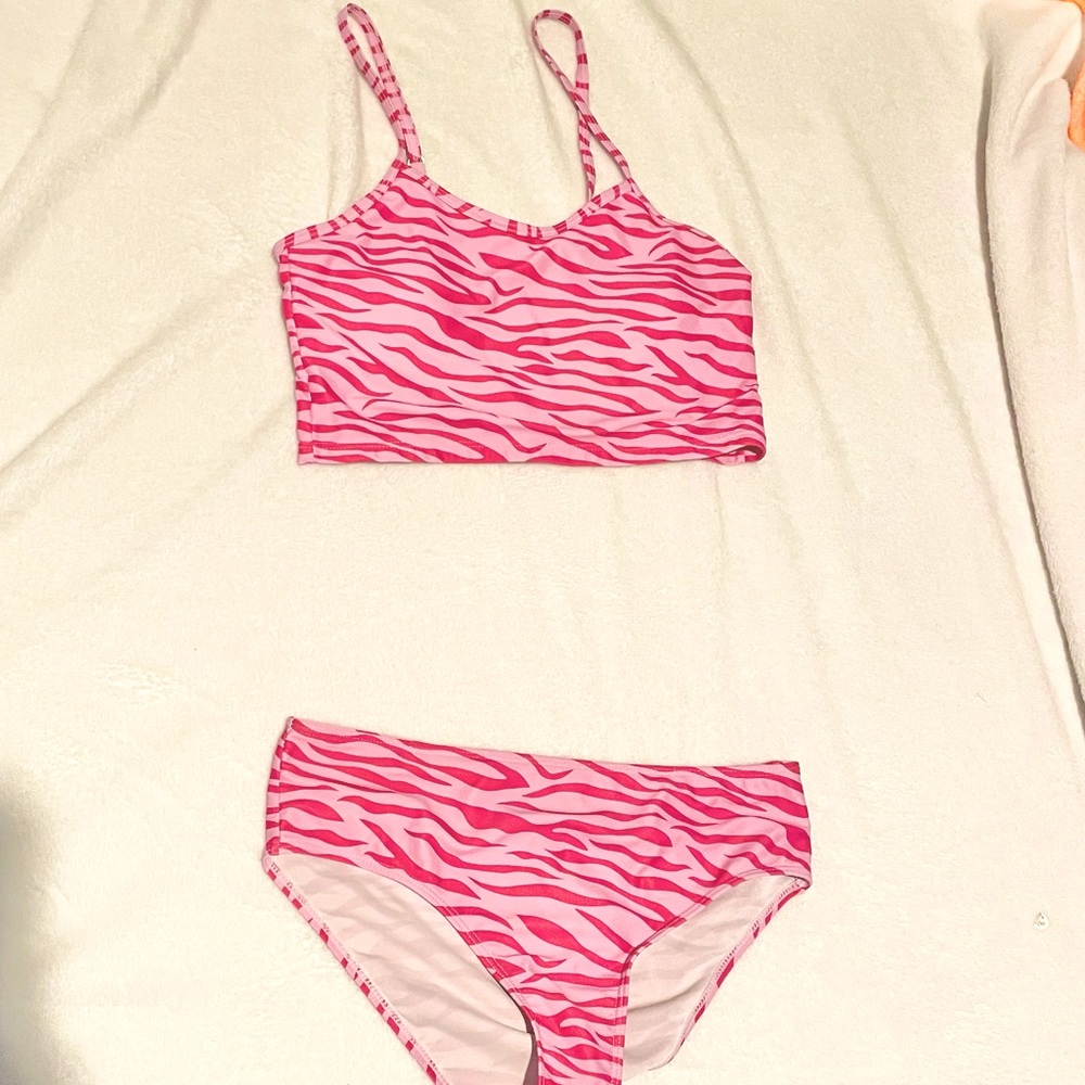 A pink zebra striped bikini